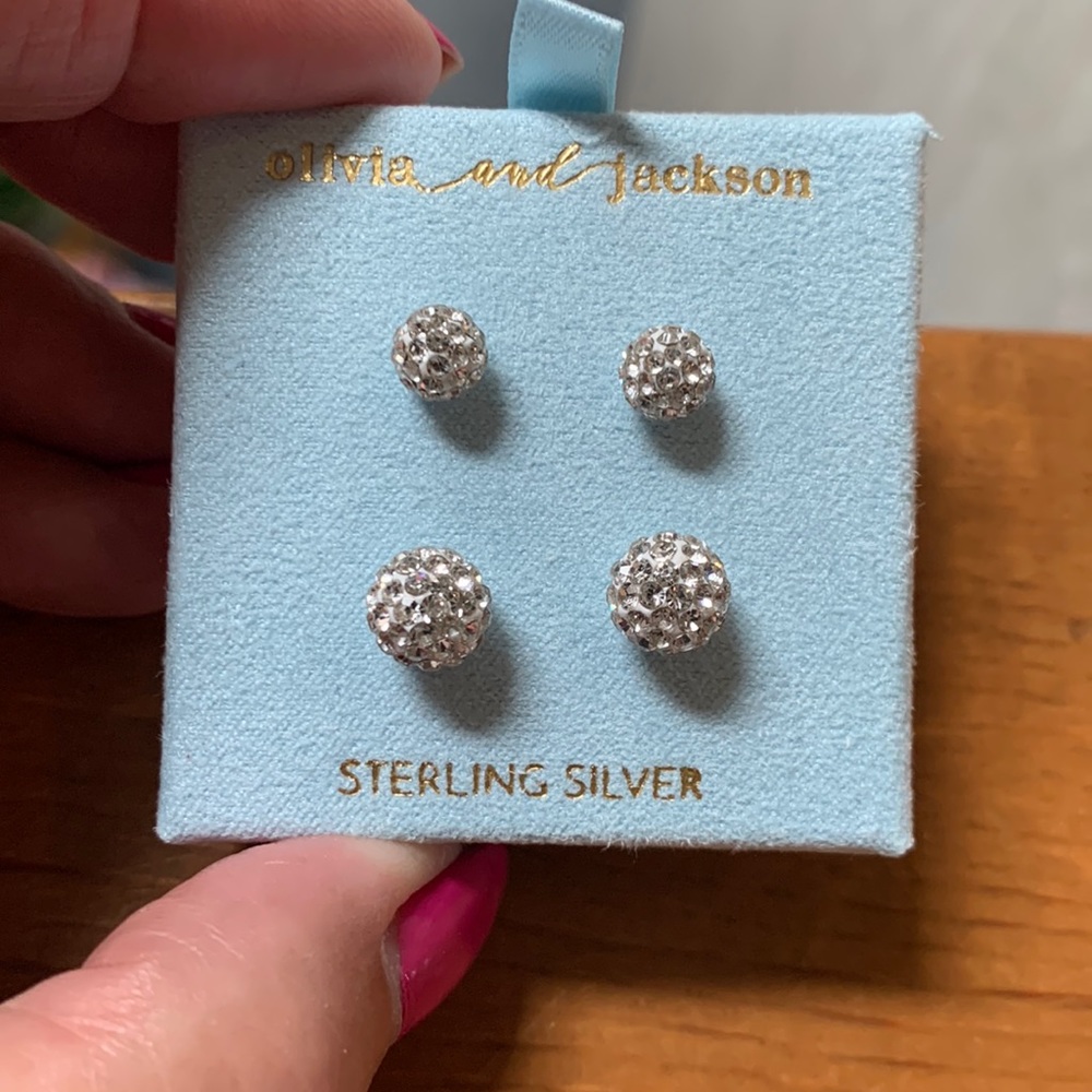 Faux diamond earrings. Look much better in person. They have a lot of sparkle.